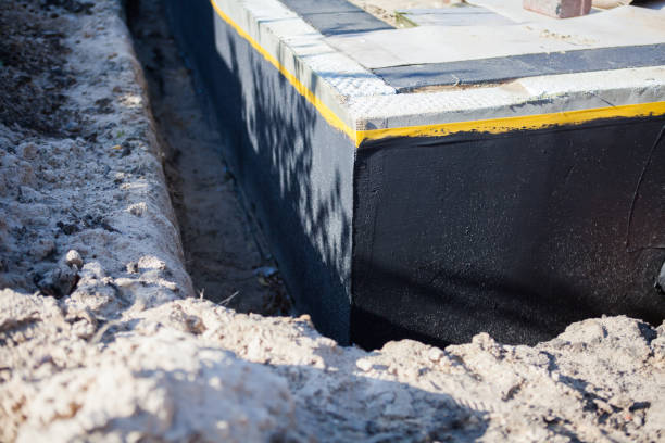 Professional Emergency Waterproofing technician working in Elizabeth, PA